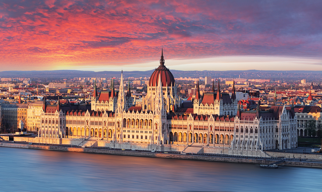 Budapest parliament at dramatic sunset