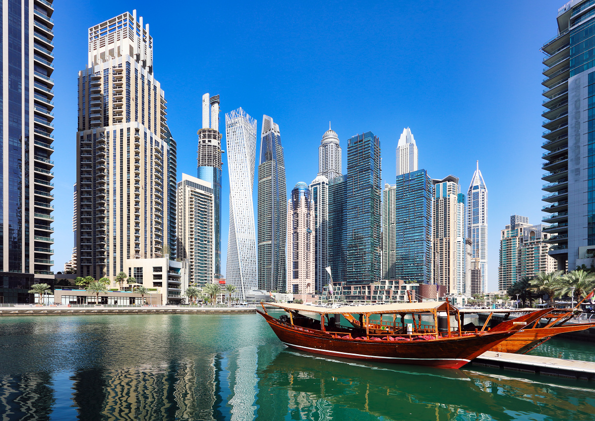 Dubai Marina at day with boat
