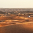 Sunset over the sand dunes in desert